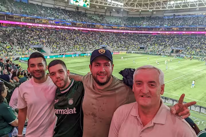 Local host and fans at Allianz Parque stands during Palmeiras match in São Paulo game experience tour