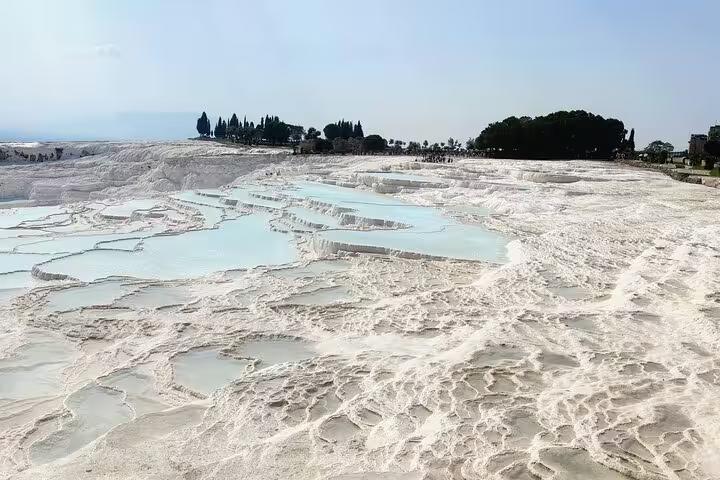 Pamukkale white travertine terraces and turquoise pools on an 8-day Turkey mini group flight tour