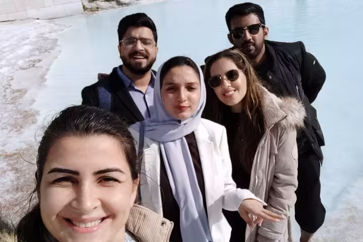 Travelers selfie at Pamukkale travertines and thermal pools on the 8-day Cappadocia to Antalya tour