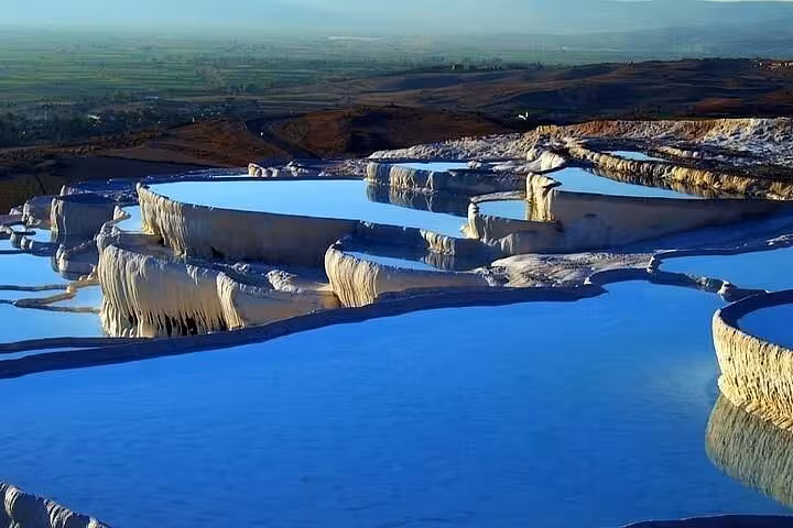 Pamukkale white travertine terraces and thermal pools on a private full-day tour from Antalya, Turkey