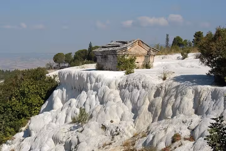 White travertine terraces and ancient ruins at Pamukkale on a private day tour from Kusadasi or Selcuk