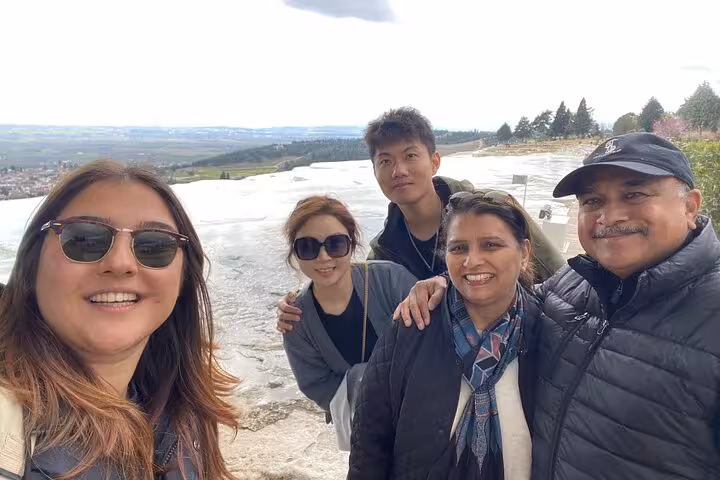 Friends selfie on Pamukkale white travertine terraces during private tour from Kusadasi or Selcuk