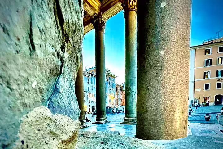 View from the Pantheon columns onto a lively Roman square, showcasing hidden architectural treasures on a private city tour