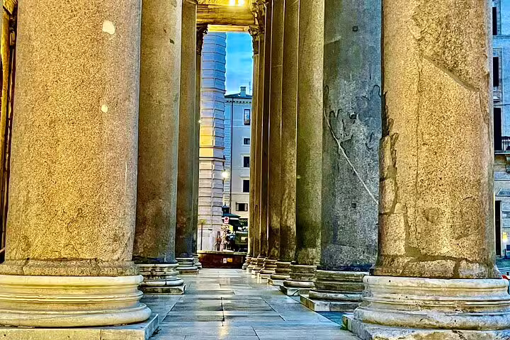 Ancient marble columns of the Pantheon at dusk on a family-friendly Rome private tour exploring hidden historical treasures