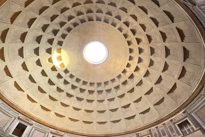 Magnificent oculus and coffered dome of the Pantheon Rome viewed on a skip-the-line entry tour.