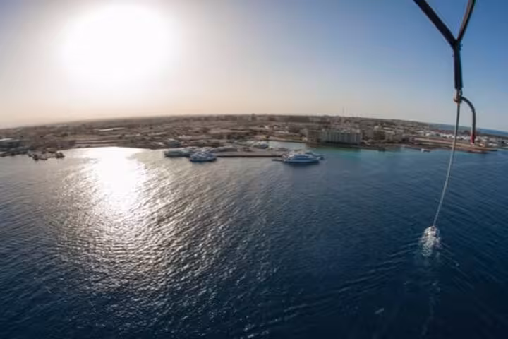 Aerial view from parasailing over Hurghada marina and Red Sea, watersports combo tour with transfer