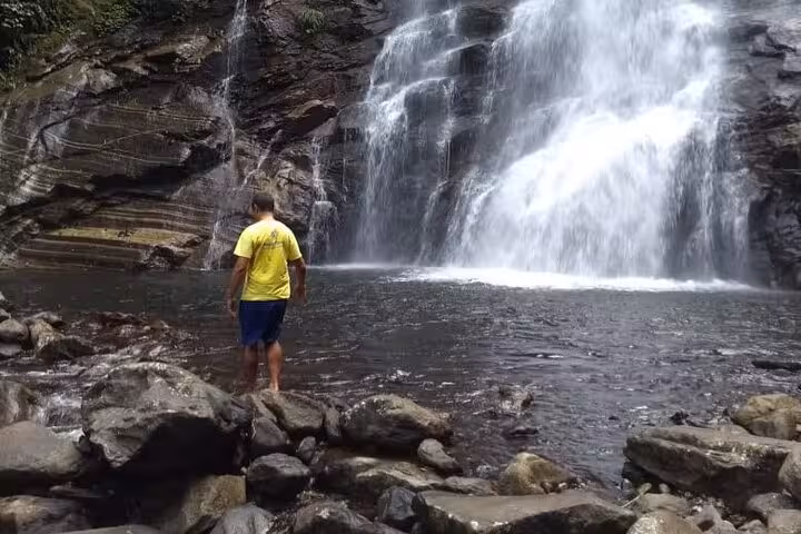 Discover the serene beauty of Melancia Waterfall on a guided hiking tour in Paraty, ideal for outdoor enthusiasts.