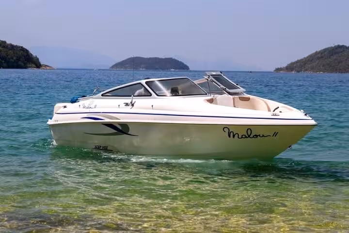 Experience the thrill of a private boat tour on Paraty's serene, turquoise waters with panoramic views.