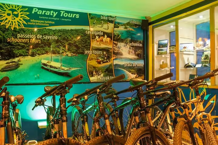 Bikes ready for rental at Paraty Tours headquarters, highlighting diverse tour options like bike and jeep tours.