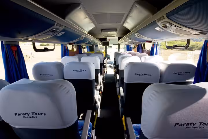 Spacious interior of Paraty Tours bus for private transport from Rio de Janeiro to Paraty.