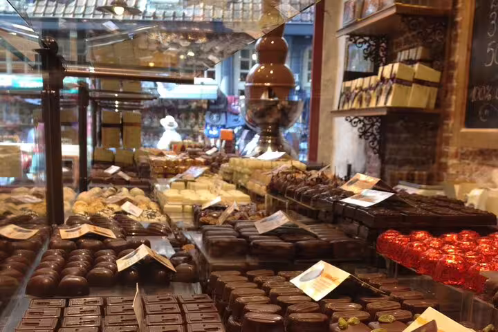 Discover a vibrant selection of gourmet chocolates during the Paris Gourmet Tour Wine and Fromage Adventure.