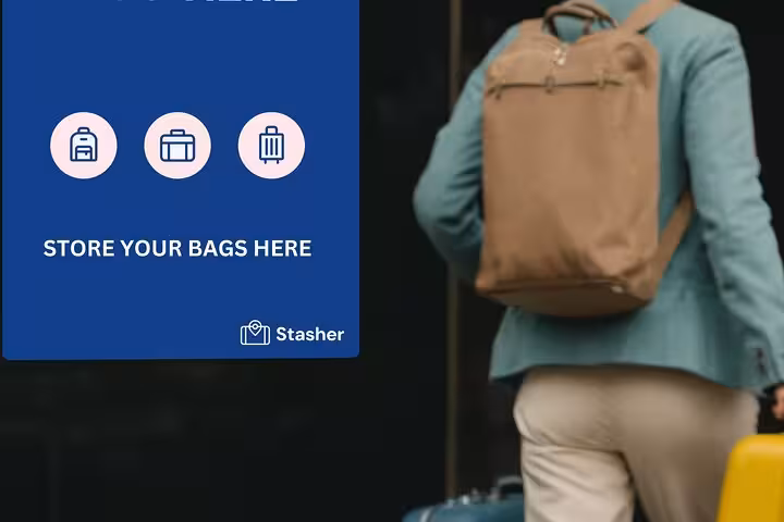 Traveler with backpack and suitcase beside “Store your bags here” sign for Paris Louvre luggage storage