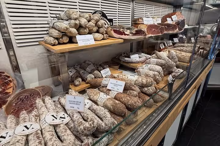 Cured saucisson and charcuterie display for Paris food, wine and cheese tasting tour with Napoleon tale