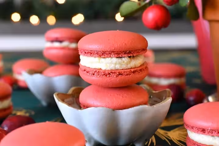 Experience authentic Parisian macarons with creamy filling on the Le Marais food tour.