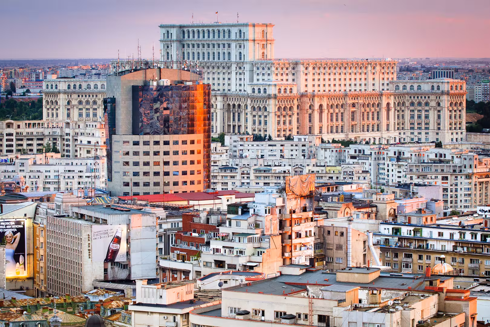 Aerial view of Parliament Palace in Bucharest amidst the cityscape, ideal for a fast-track guided tour experience.