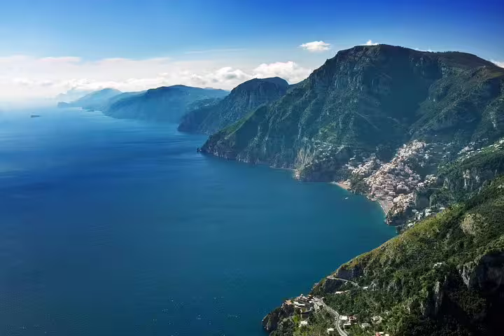 Stunning coastal view from the Path of the Gods, showcasing dramatic cliffs and azure waters near Sorrento.