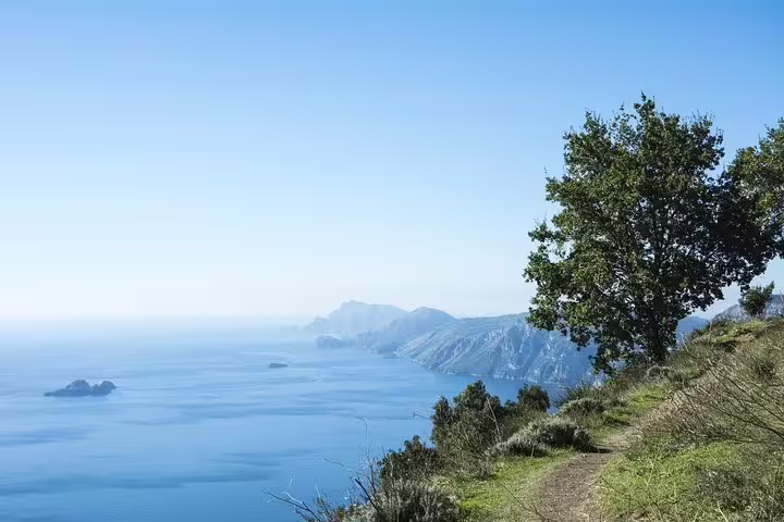 Breathtaking view from Path of the Gods hiking trail in Sorrento, overlooking cliffs and the Mediterranean Sea.