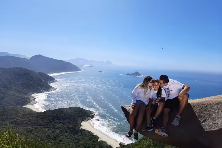 Group embraces breathtaking coastal scenery at Pedra do Telégrafo, highlighting the adventure of this guided hike.