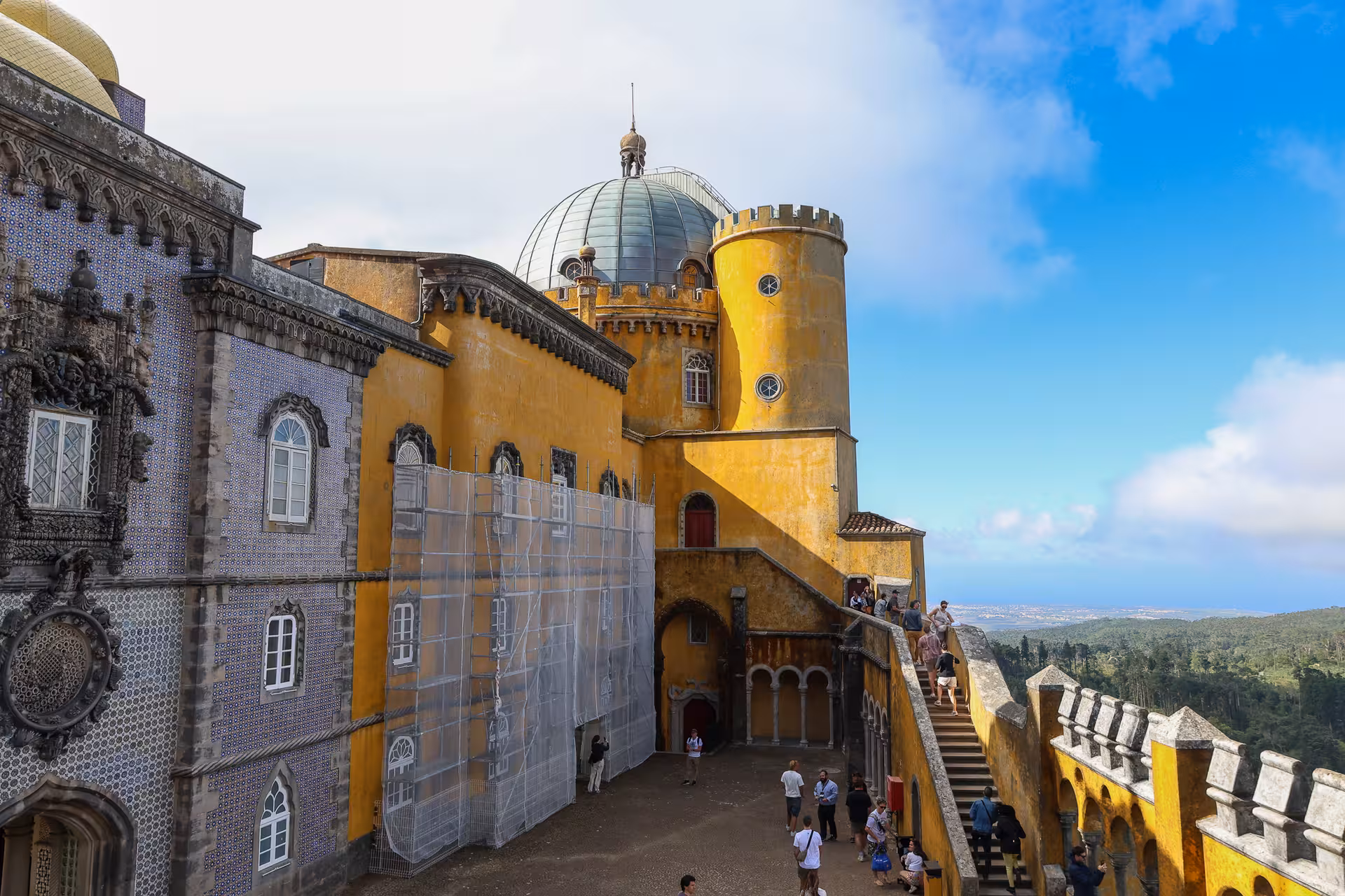 Explore the vibrant architecture of Pena Palace on a guided small group tour from Lisbon to Sintra.