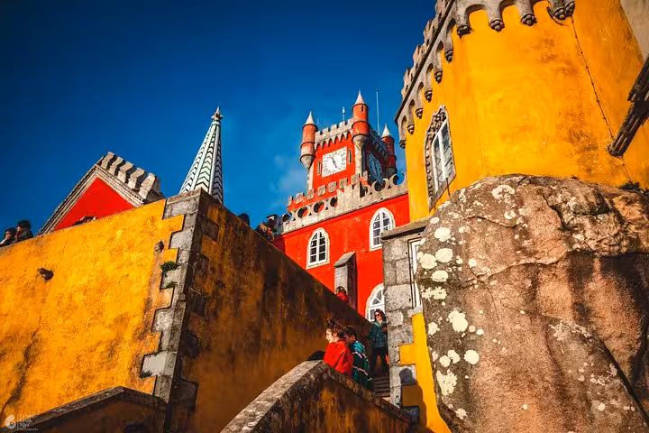 Pena Palace Sintra colorful terraces and towers, ideal stop on self-drive tour to all Sintra monuments