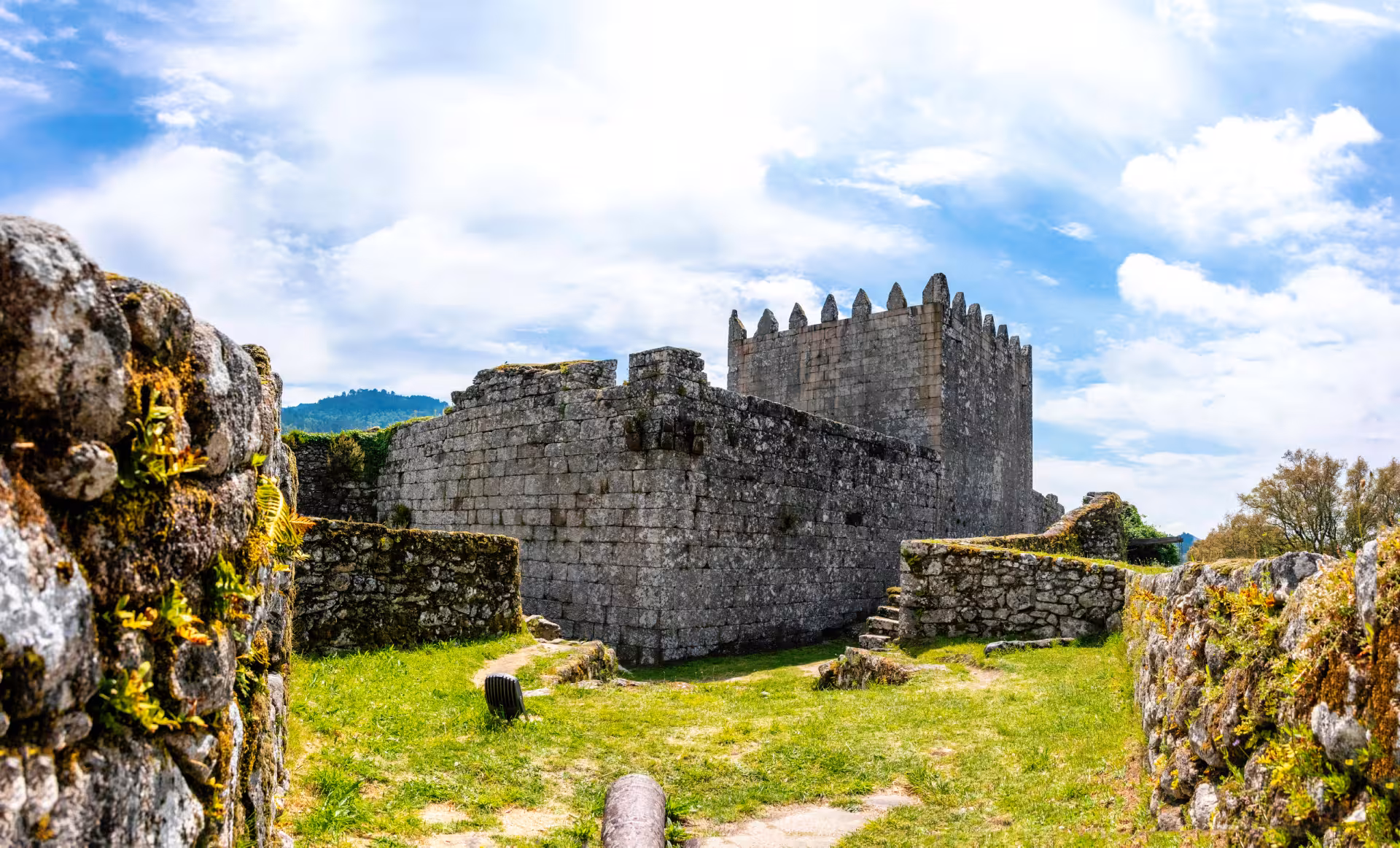 Medieval stone castle remnants under a clear sky in Peneda Geres National Park, perfect for a 3-day private tour.