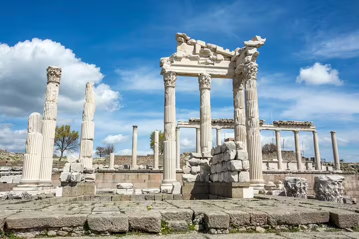 Ancient ruins of Pergamon under a bright blue sky, featured in the Spectacular Pergamon & Asceplion Tour.