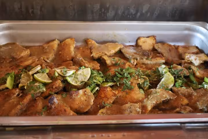 Hot lunch buffet on Petra day tour from Sharm El Sheikh by ferry, grilled chicken with herbs and lime