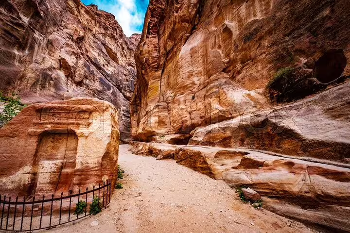 Rock-cut tombs and sandstone canyon trail in Petra, Jordan, on a full-day tour from Sharm El Sheikh