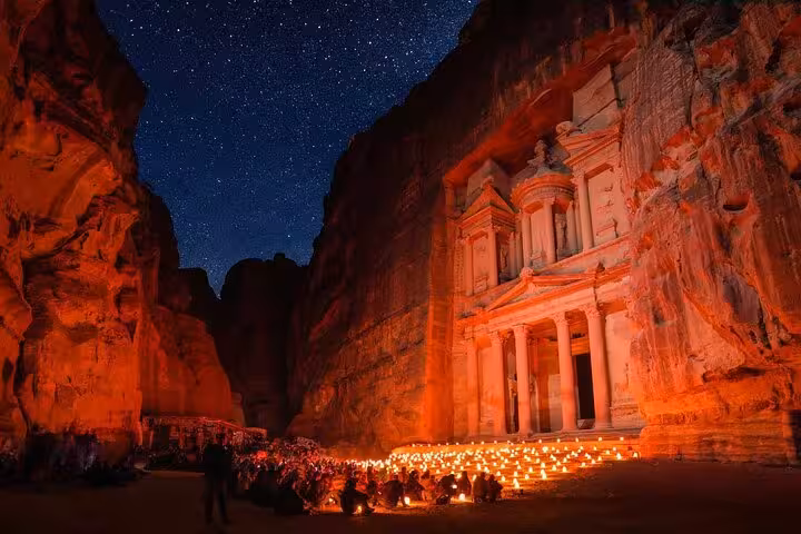 Petra by Night candlelit Treasury in Siq, highlight of Petra Temple and Jordan full day tour from Sharm El Sheikh