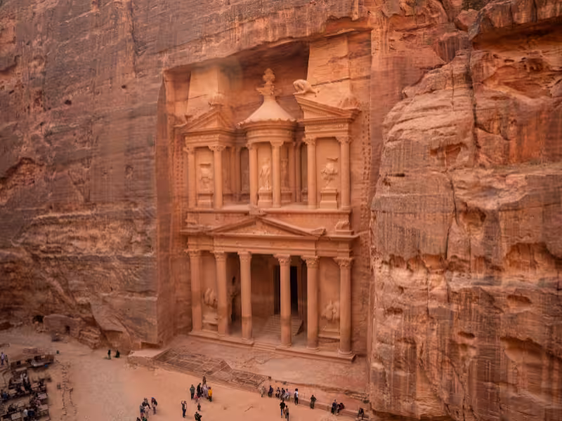 Petra Treasury Al-Khazneh carved in rose sandstone canyon, highlight of Timeless Jordan tour