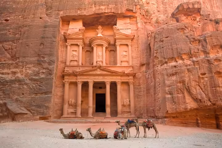 Petra Treasury (Al-Khazneh) with camels resting, iconic stop on a day trip to Petra, Jordan by ferry