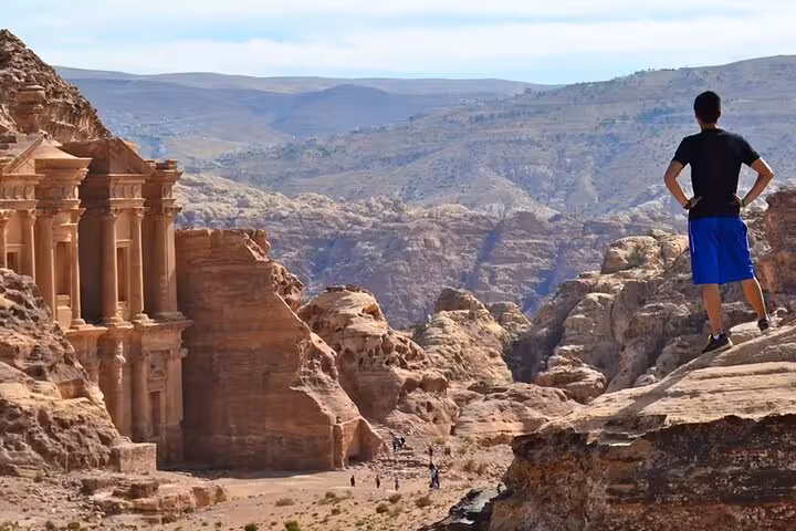 Traveler stands above Petra Treasury on Sharm El Sheikh to Lost City Petra day trip by ferry