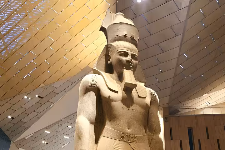 Colossal pharaoh statue inside the Grand Egyptian Museum in Cairo, highlight of the 3-day Cairo tour