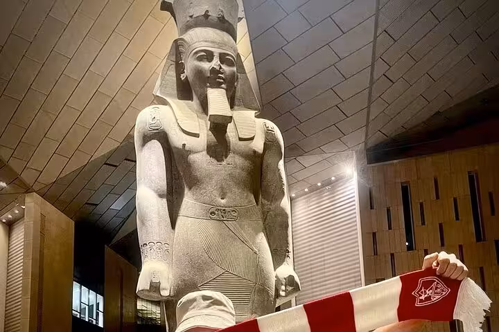 Colossal pharaoh statue inside the Grand Egyptian Museum Cairo, highlight of Sharm El Sheikh day tour