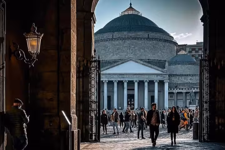 Visitors exploring the iconic Piazza del Plebiscito in Naples, a highlight of private tours from Sorrento.