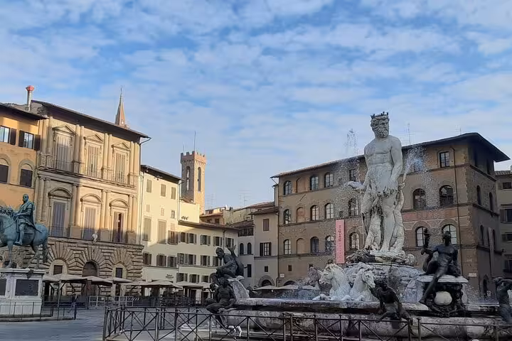 A view of Piazza della Signoria featuring the Neptune Fountain, perfect for the Accademia & Uffizi Galleries tour.