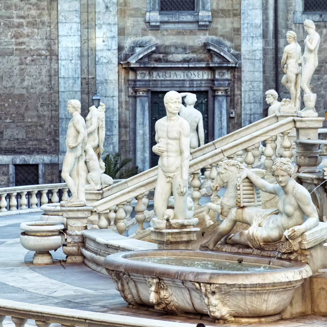 Close-up of marble statues and cascading basins at Piazza Pretoria fountain in Palermo, visited on private Monreale tours