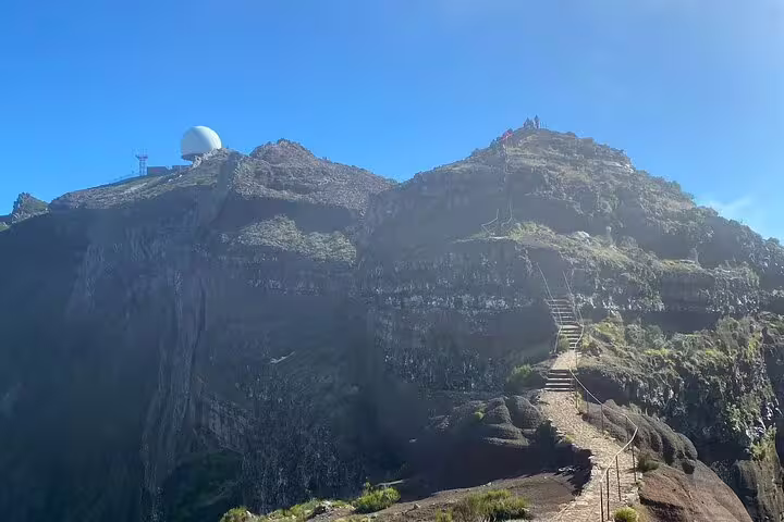 Pathway leading up Pico do Arieiro with observatory in view, ideal for a self-guided sunrise adventure.