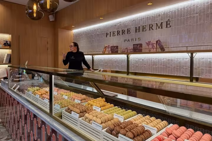 Pierre Hermé Paris macaron counter stop on Paris food, wine and cheese tasting with Napoleon love story