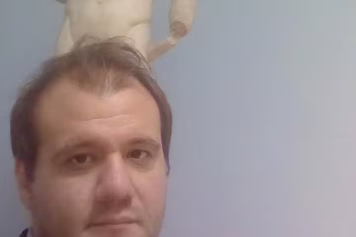 Professional driver ready for Piraeus Cruise Terminal to Athens City Centre transfer, meet and greet service