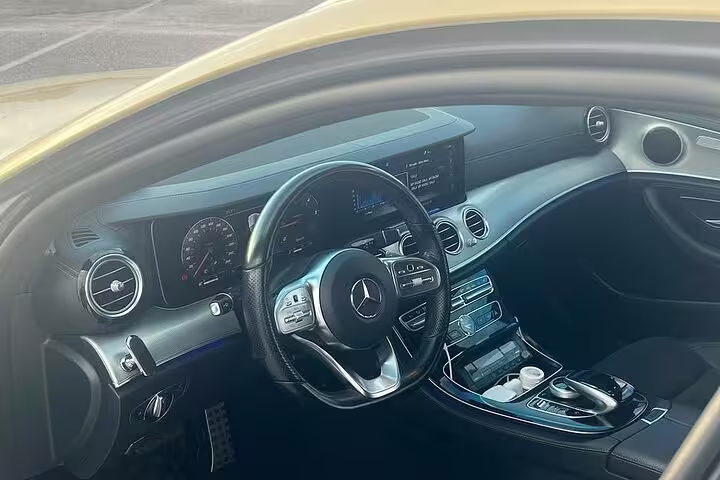 Luxury private car interior for Piraeus Port to Athens city center arrival transfer with professional driver