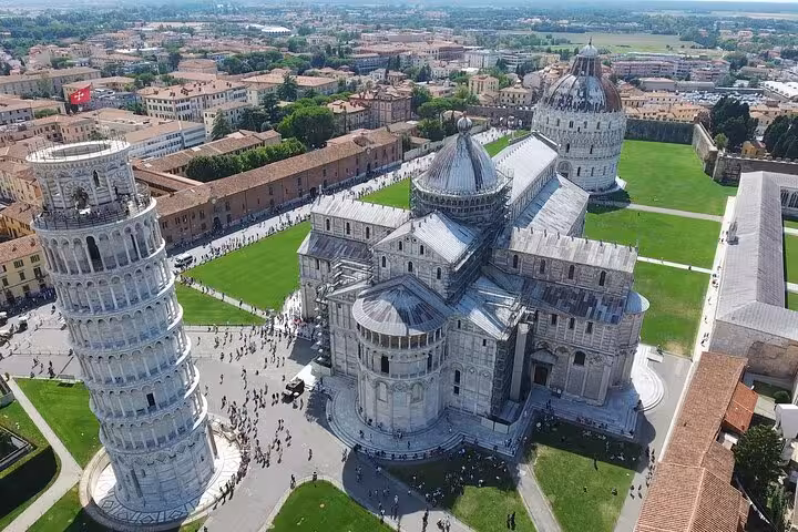 Aerial view of Pisa's Leaning Tower and Cathedral, highlighting the architectural beauty on a day trip from Florence.