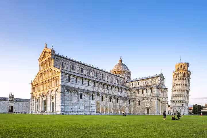 Explore Pisa Cathedral and Leaning Tower on a vibrant day trip from Florence, featuring iconic architectural marvels.