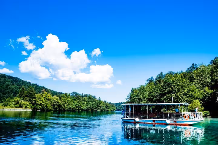 Boat cruise on Plitvice Lakes National Park, Croatia, scenic stop on 3-day Zagreb to Dubrovnik tour