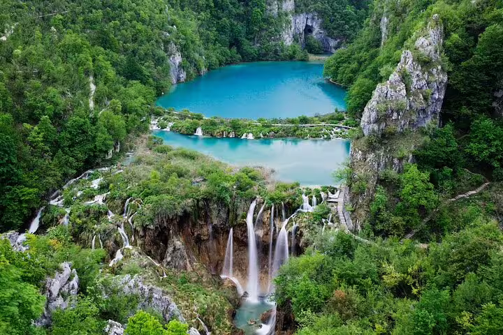 Aerial view of Plitvice Lakes waterfalls and turquoise pools, highlight of a private tour from Split