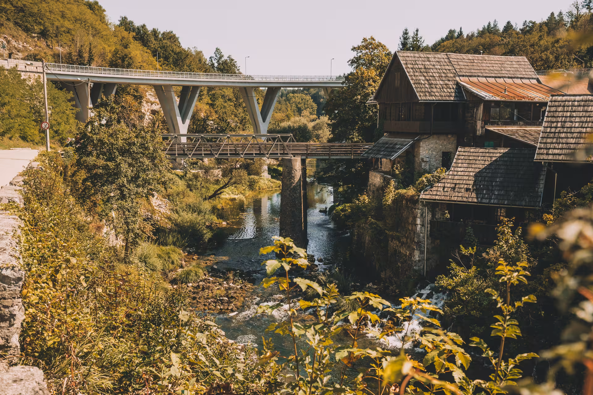 Traditional watermill and bridges near Plitvice Lakes on a guided day trip from Split, Croatia