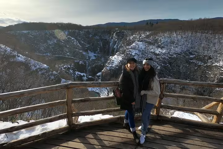 Winter viewpoint at Plitvice Lakes on a private day trip from Zagreb, with snowy canyon and falls