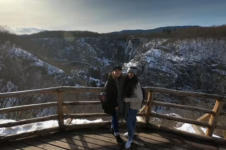 Winter viewpoint at Plitvice Lakes on a small group tour from Zagreb, with canyon and waterfalls behind
