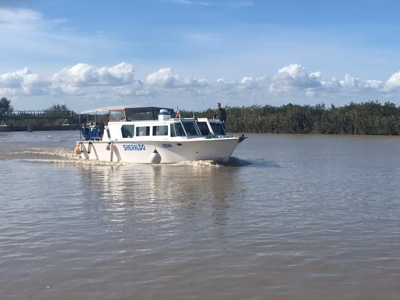 Boat cruising the Po Delta river on sunset tour to Isola dell’Amore, nature spotting and aperitif on board