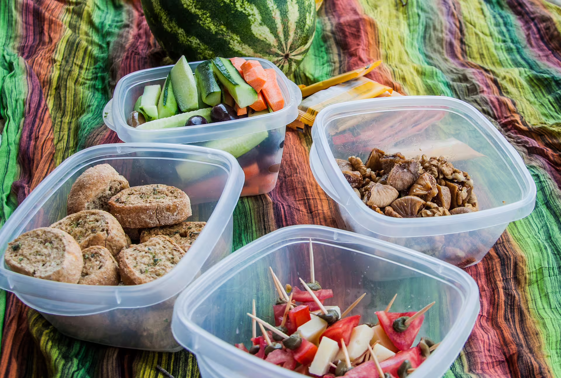 Picnic snacks and fresh fruit prepared for Polylimnio Waterfalls hiking tour in Messinia, Peloponnese